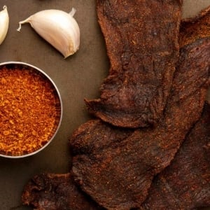 Smoked venison jerky on a platter