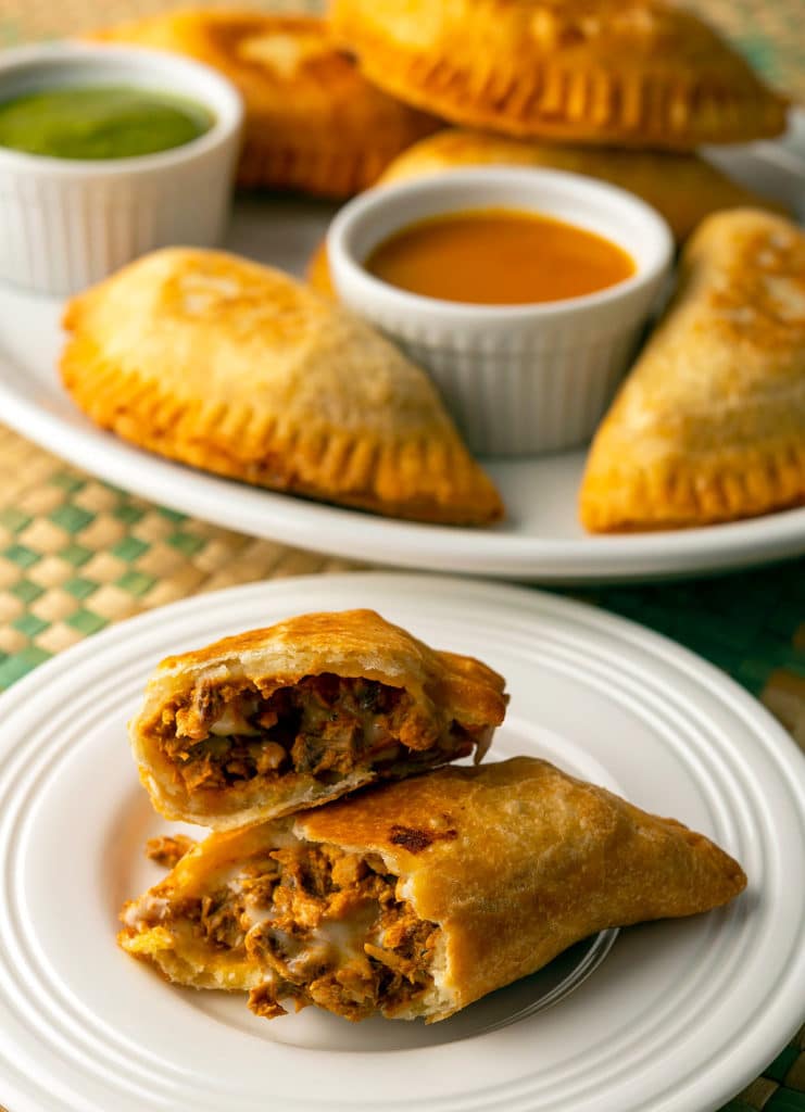 https://honest-food.net/wp-content/uploads/2021/11/fried-empanadas-broken-open-741x1024.jpg