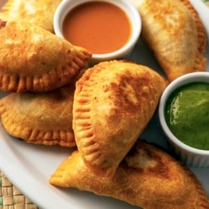 A platter of fried empanadas