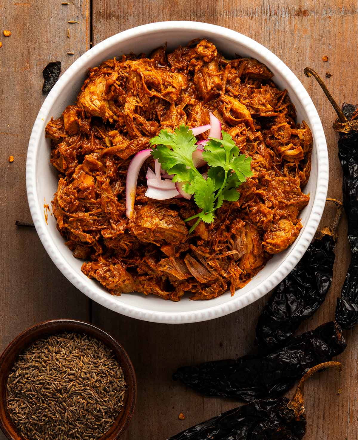 A bowl of Sinaloan chilorio with chiles and cumin.