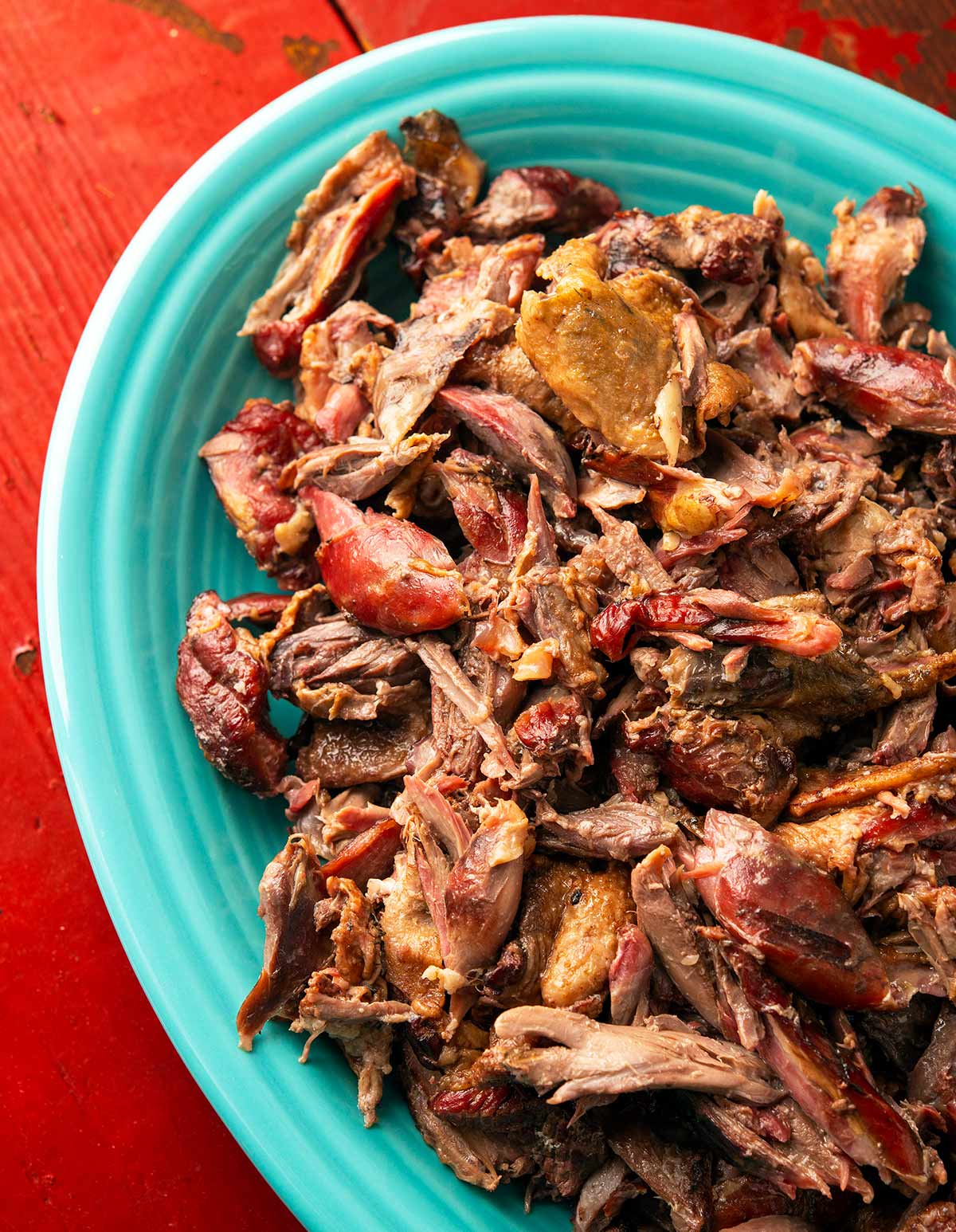 Close-up of a platter of pulled duck. 