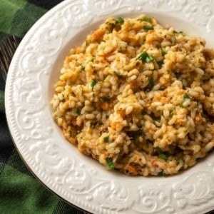 Closeup of a bowl of salmon risotto.