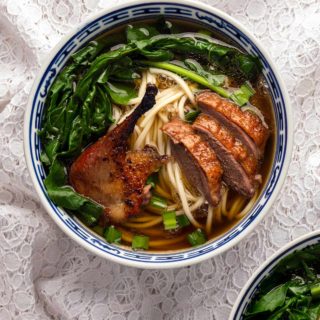 A bowl of Chinese duck noodle soup.