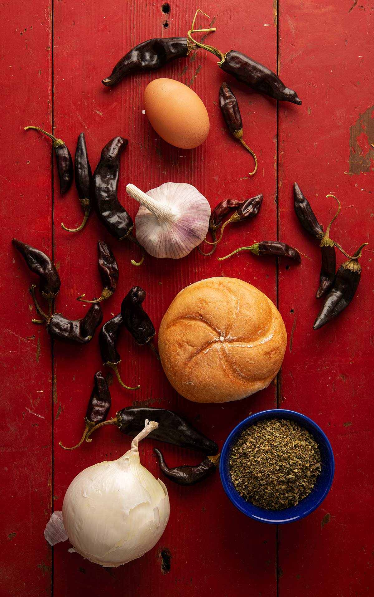Ingredients to make pacholas: chiles, eggs, herbs, stale bread, onions and garlic. 