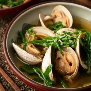 Close up of a bowl of Japanese clam soup.