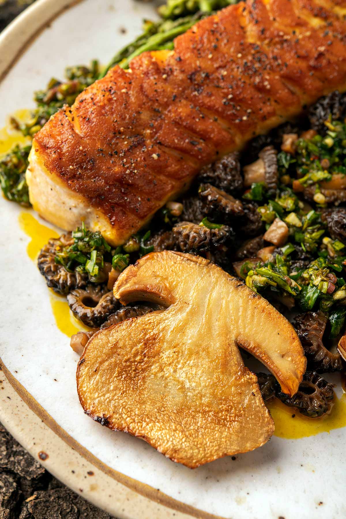 Close up of porcini mushrooms on a plate. 