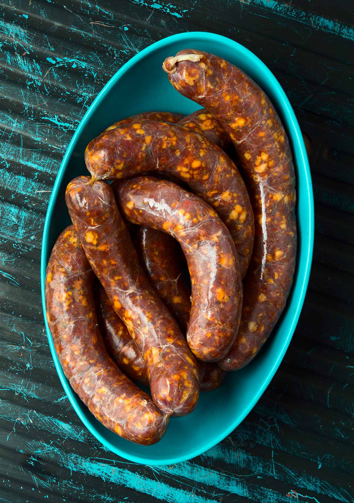 A platter of hot Italian sausages.