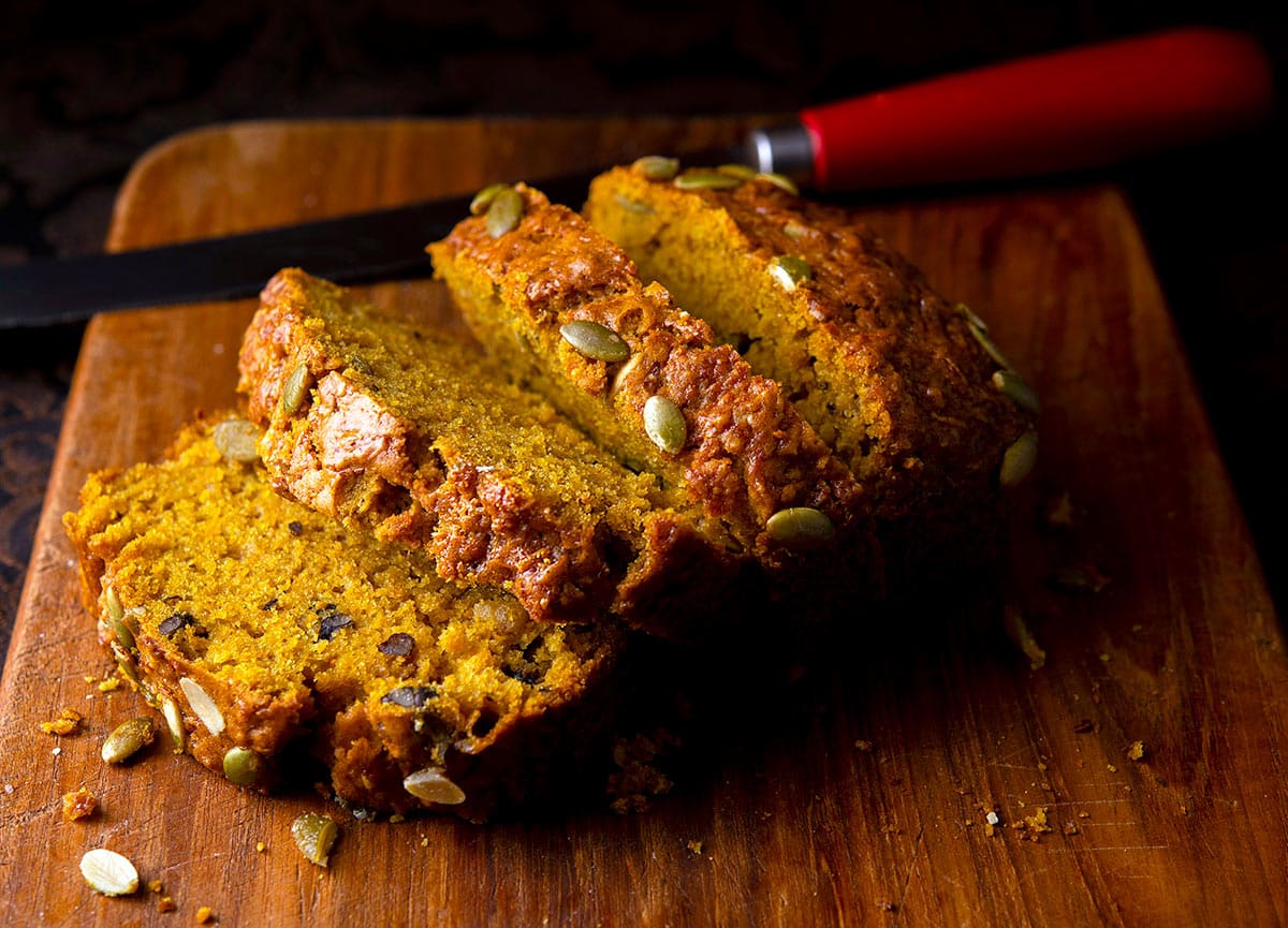 Butternut bread sliced on a cutting board. 