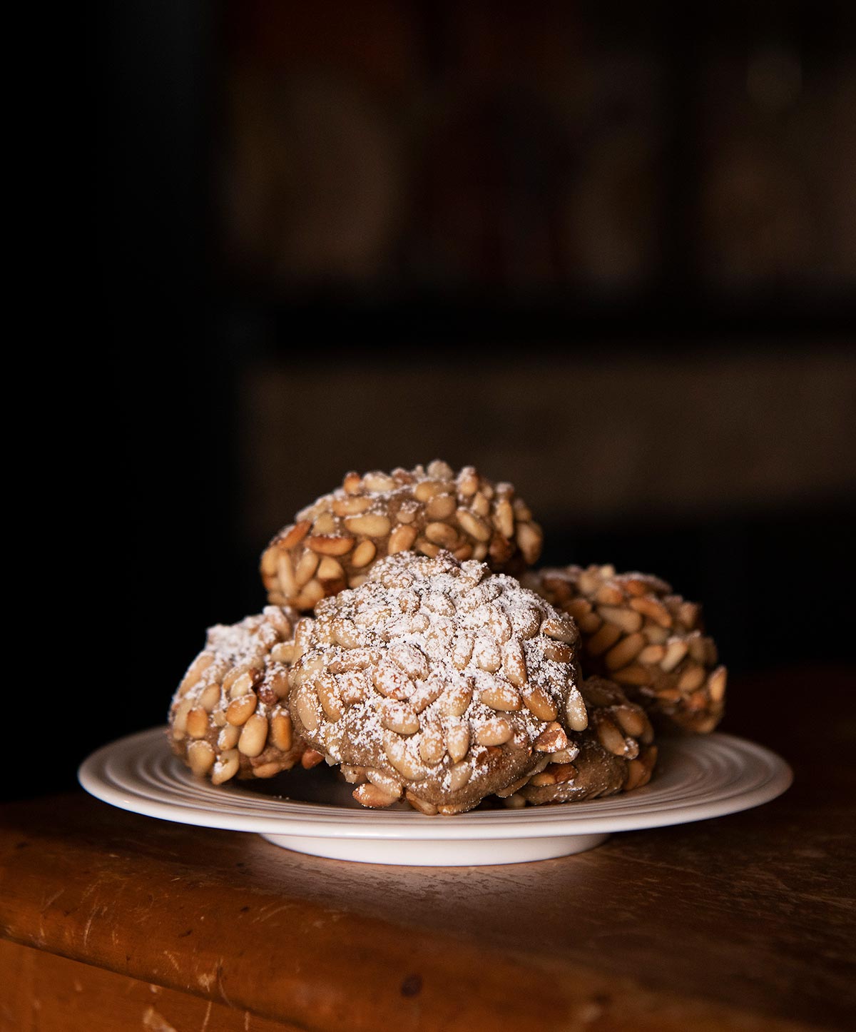 A stack of pignoli on a plate. 