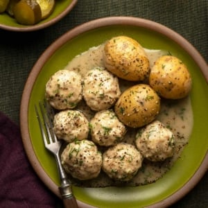 Pike balls, a classic pike recipe, served with potatoes and gravy.