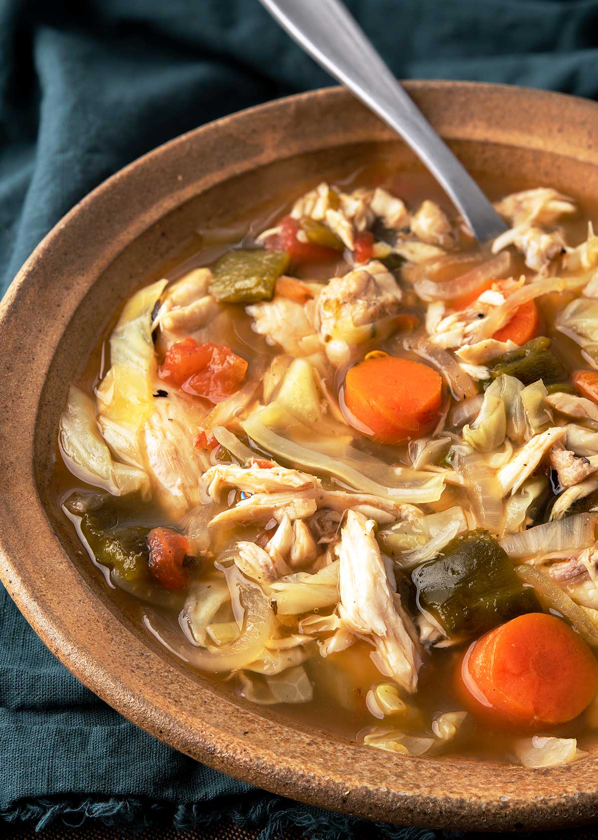 Close up of a bowl of Mexican fish soup. 