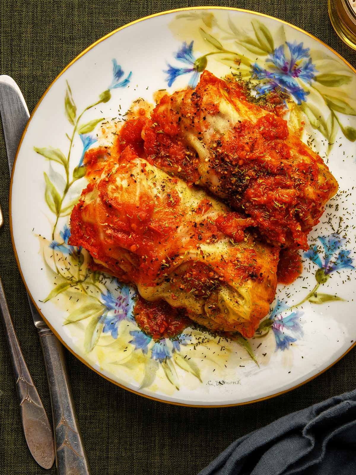 Close up of Polish cabbage rolls in tomato sauce. 
