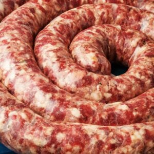 Close up of a coil of Cumberland sausage.