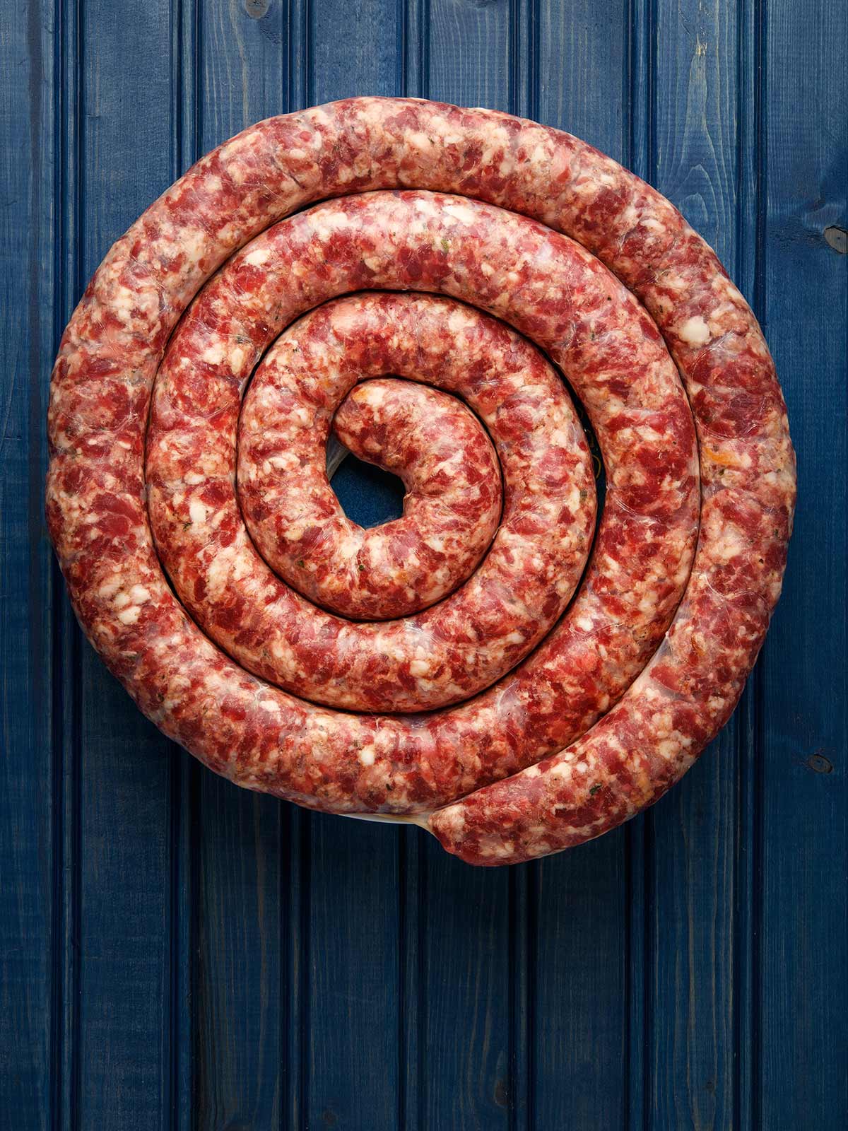 A coil of freshly made Cumberland sausage. 