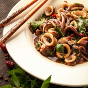 A bowl of squid stir fry.