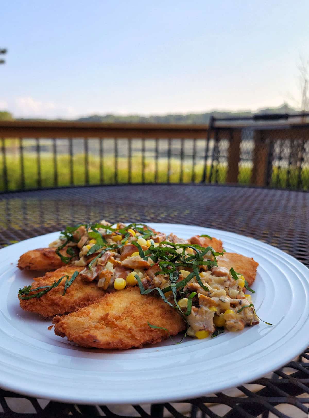 Chanterelle sauce over fish, served at sunset. 
