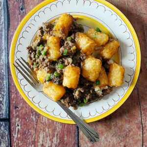 A serving of tater tot hotdish, ready to eat.