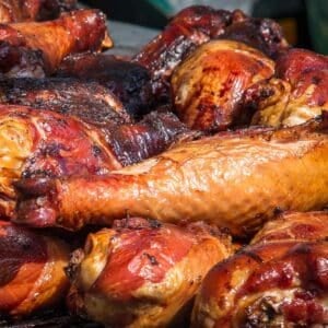 BBQ turkey legs on the grill.
