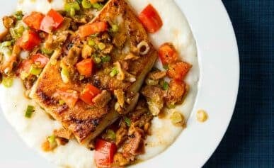 A plate of Southern fish and grits, made with tripletail.
